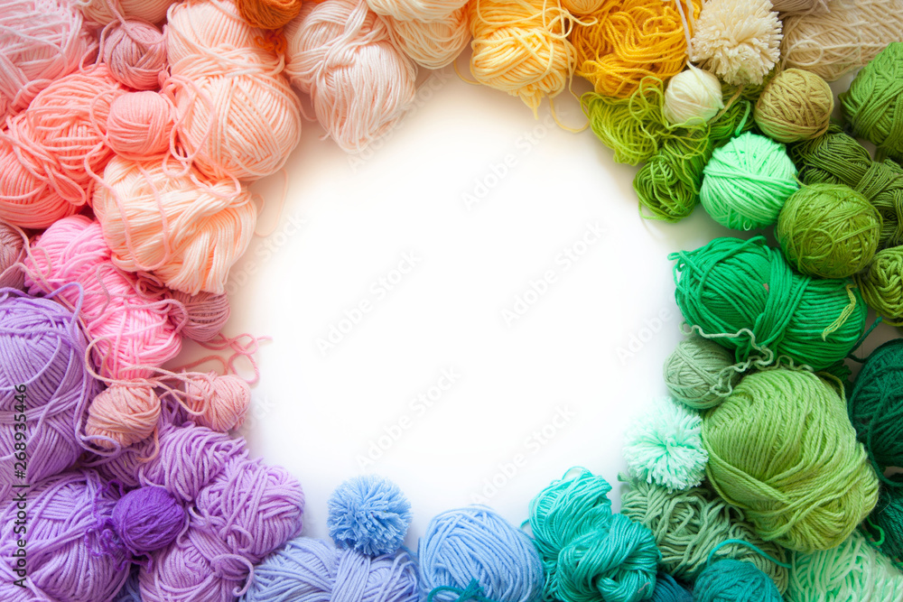 Color wheel of yarn. Rainbow and spectrum. White background. Threads of  different colors. Stock Photo | Adobe Stock