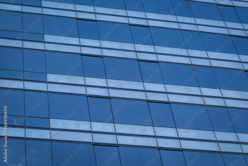 Glass windows of modern office building Glass windows of modern office building