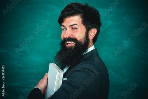 Teachers day. Professor in class on blackboard background. Chalkboard copy space. © Volodymyr