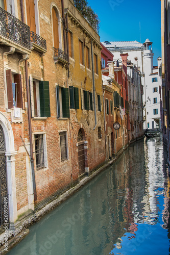 Narrow canals are famous and typical in Venice,Italy, 2019