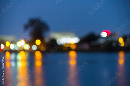 Beautiful blurred city lights with bokeh effect reflected