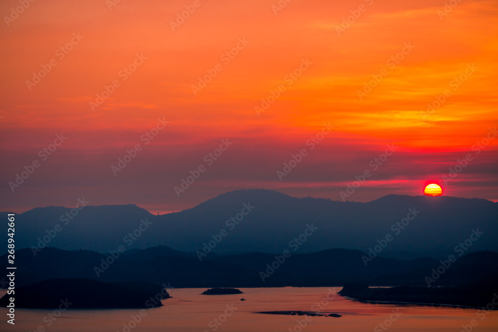 The natural background of the beautiful twilight sky, the surrounding atmosphere (trees, rivers, mountains) is a beautiful view of the journey, the view point. 