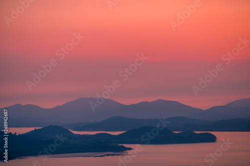 The natural background of the beautiful twilight sky, the surrounding atmosphere (trees, rivers, mountains) is a beautiful view of the journey, the view point. 