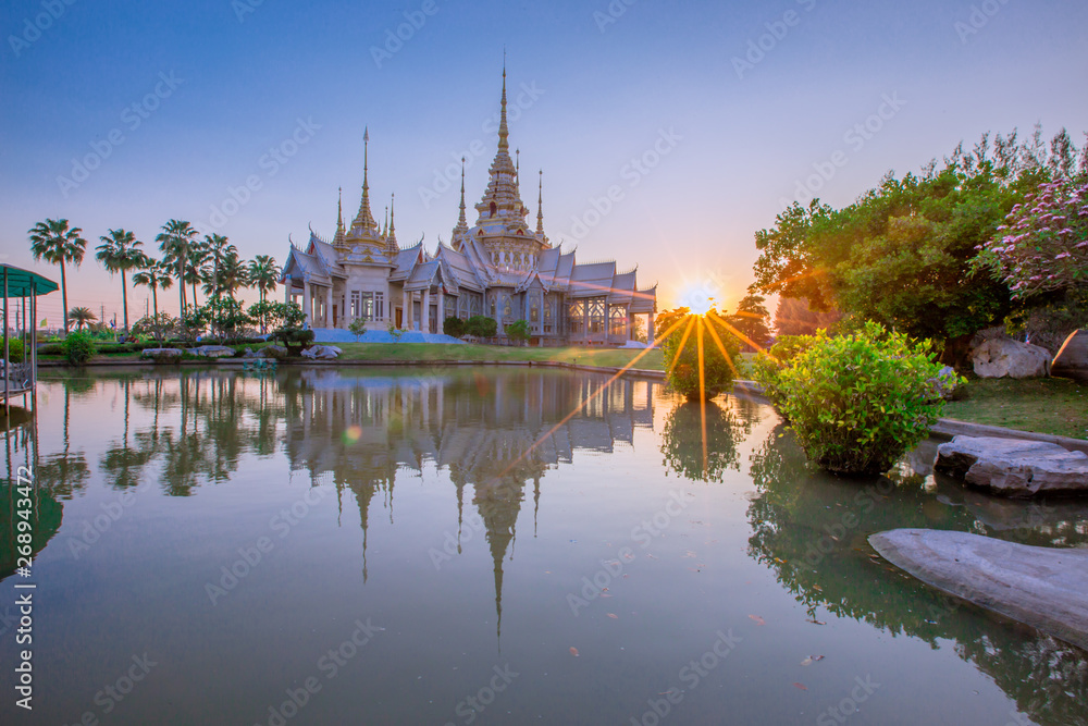 Wallpaper Wat Lan Boon Mahawihan Somdet Phra Buddhacharn(Wat Non Kum)is the beauty of the church that reflects the surface of the water, popular tourists come to make merit and take a public photo Wallpaper Wat Lan Boon Mahawihan Somdet Phra Buddhacharn(Wat Non Kum)is the beauty of the church that reflects the surface of the water, popular tourists come to make merit and take a public photo