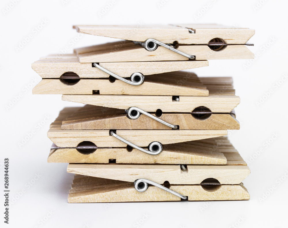 Stacked wooden clothspins