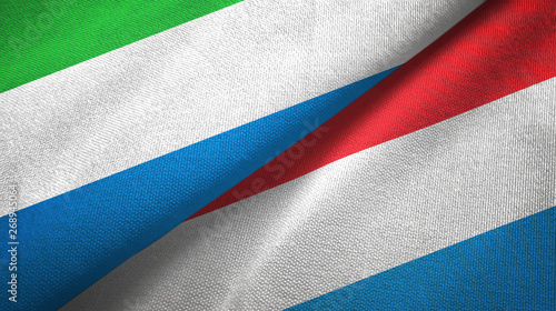 Sierra Leone and Luxembourg two flags textile cloth, fabric texture