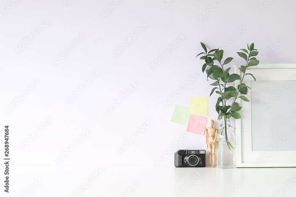 Mockup workspace desk and copy space books,plant and coffee on white desk. Mockup workspace desk and copy space books,plant and coffee on white desk.