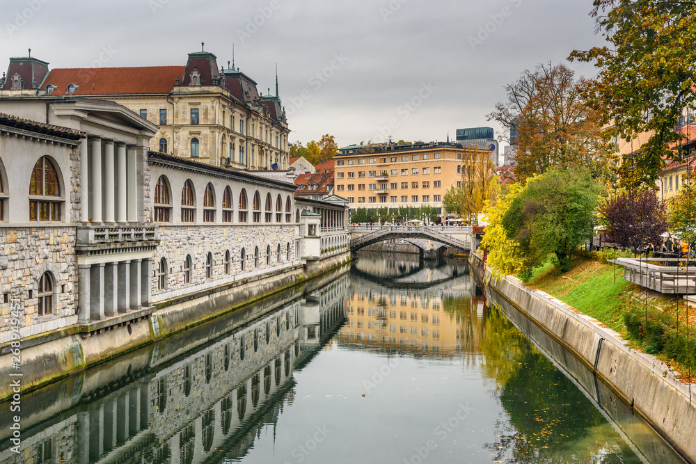 View of Ljubljanica river and Triple Bridge or Tromostovje. Ljubljana. Slovenia
