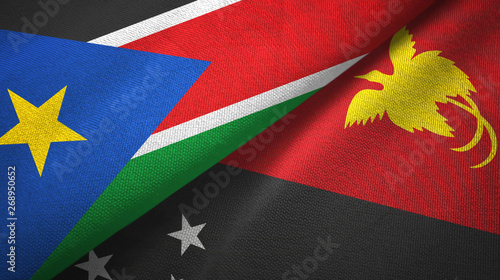 South Sudan and Papua New Guinea two flags textile cloth, fabric texture