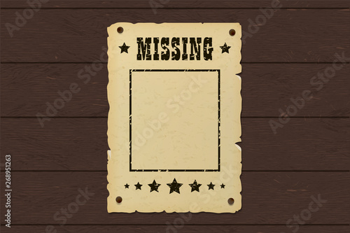 Old missing poster. Western bounty brochure nailed to a wooden wall.