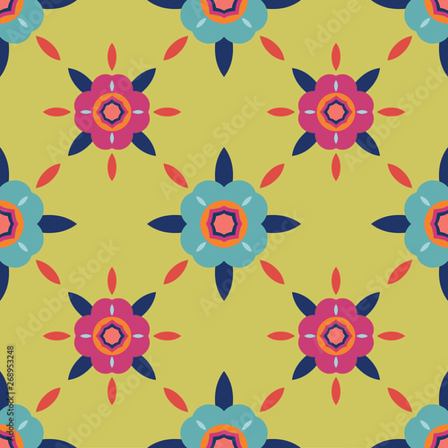 Colorful geometric floral seamless pattern in green, bright pink, turquoise, blue and orange. Repeat vector design of flower shapes and leaves, great for textiles, gift wrapping paper and fashion.
