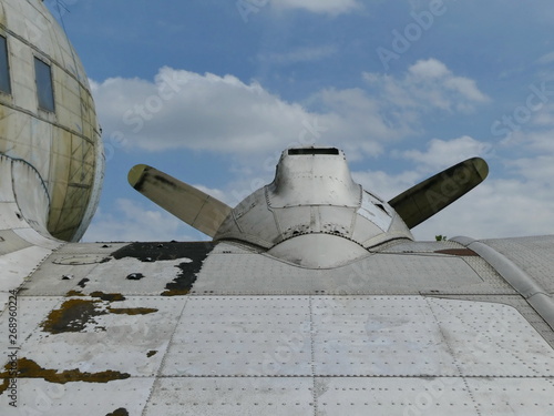 Part of wing, propeller of an old aircraft with sky backgrodun
