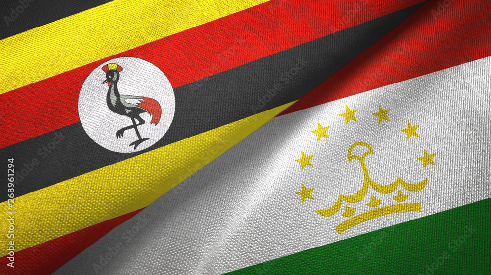 Fototapeta premium Uganda and Tajikistan two flags textile cloth, fabric texture