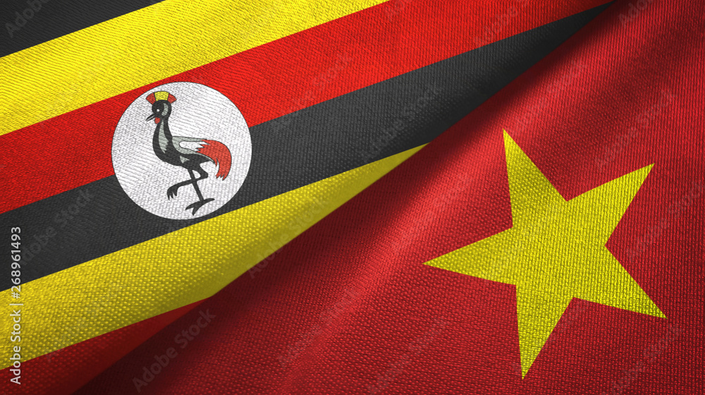 Fototapeta premium Uganda and Vietnam two flags textile cloth, fabric texture