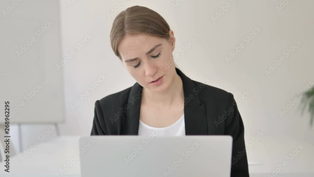 Close Up of Young Businesswoman Reacting to Loss Close Up of Young Businesswoman Reacting to Loss