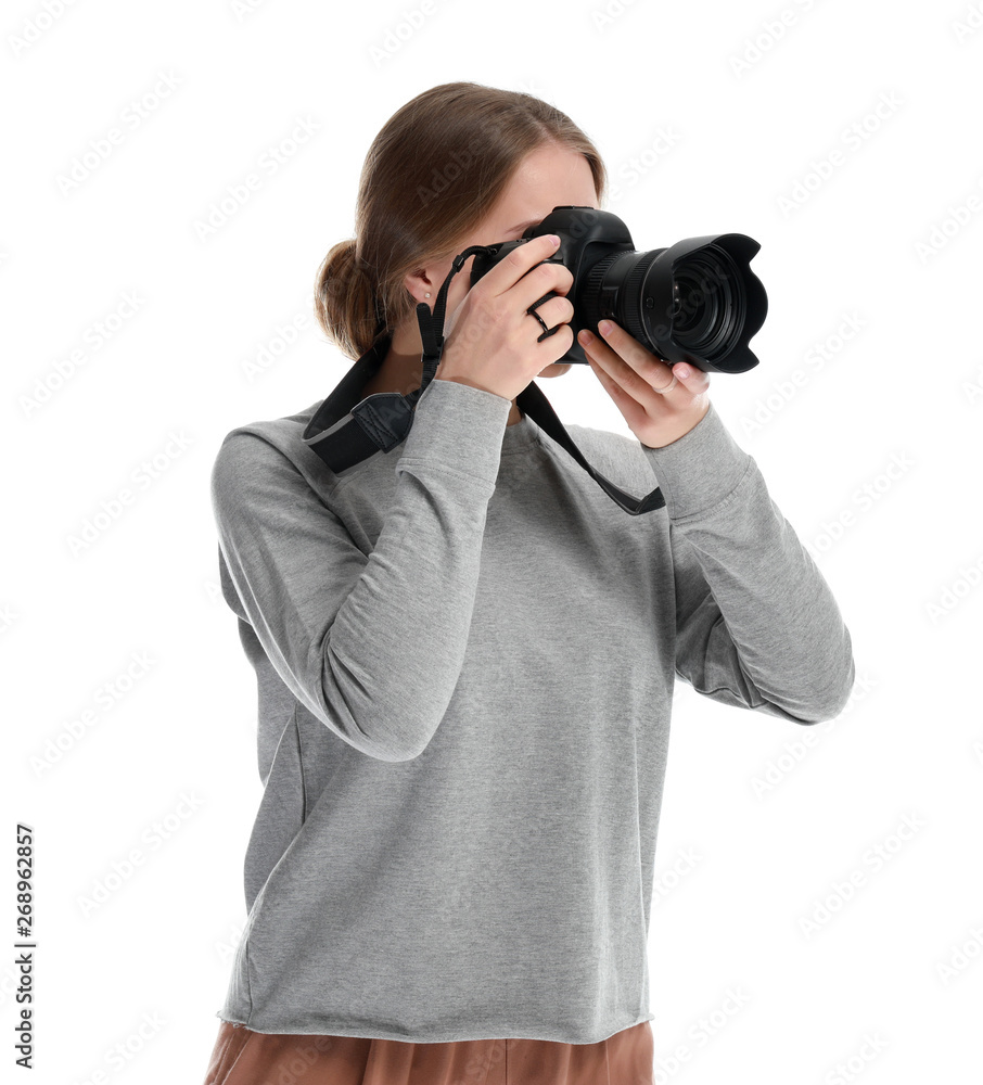 Young female photographer on white background Young female photographer on white background