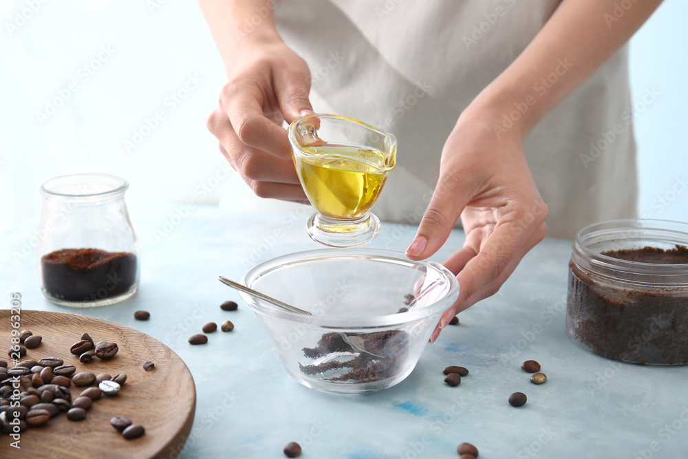 Woman preparing body scrub at table Woman preparing body scrub at table