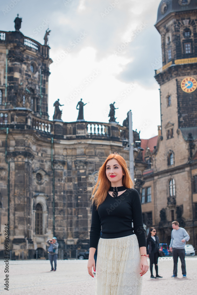 Fototapeta premium Woman in Old Europe, vacation and travelling time. Vintage style in clothes and view. Trip in Germany