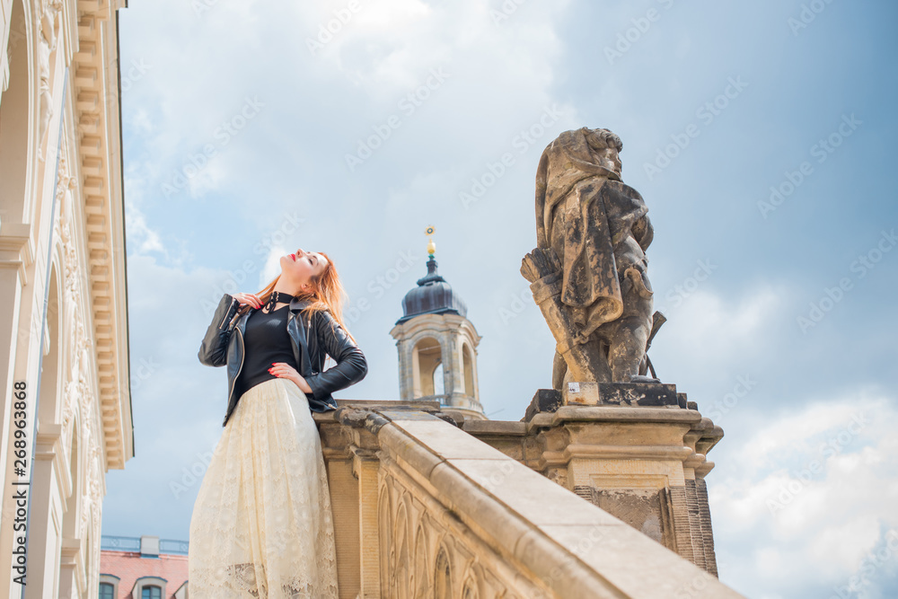Obraz premium Woman in Old Europe, vacation and travelling time. Vintage style in clothes and view. Trip in Germany