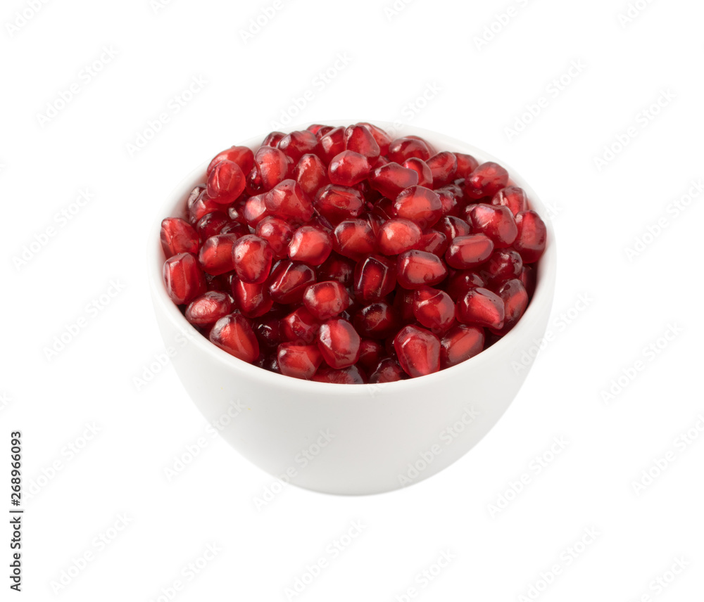 Pile of Pomegranate Seeds in Bowl Isolated on White Background Pile of Pomegranate Seeds in Bowl Isolated on White Background