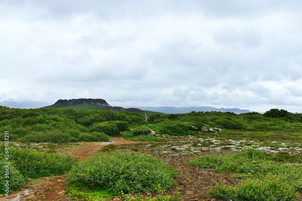 Volcano in a green landscape in the south of Snaefellsnes peninsula Volcano in a green landscape in the south of Snaefellsnes peninsula