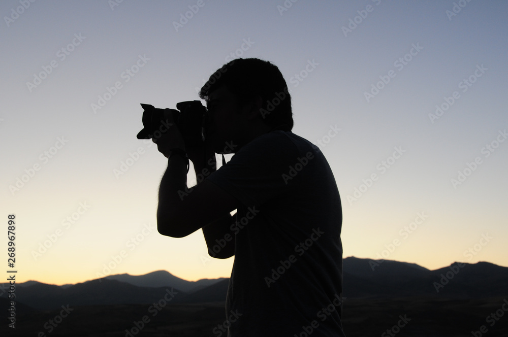 silhouette of photographer
