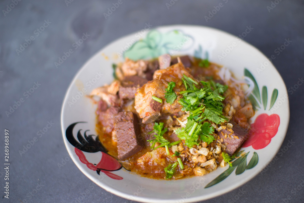 Nam Nguan Noodle, Rice noodles with spicy pork sauce.