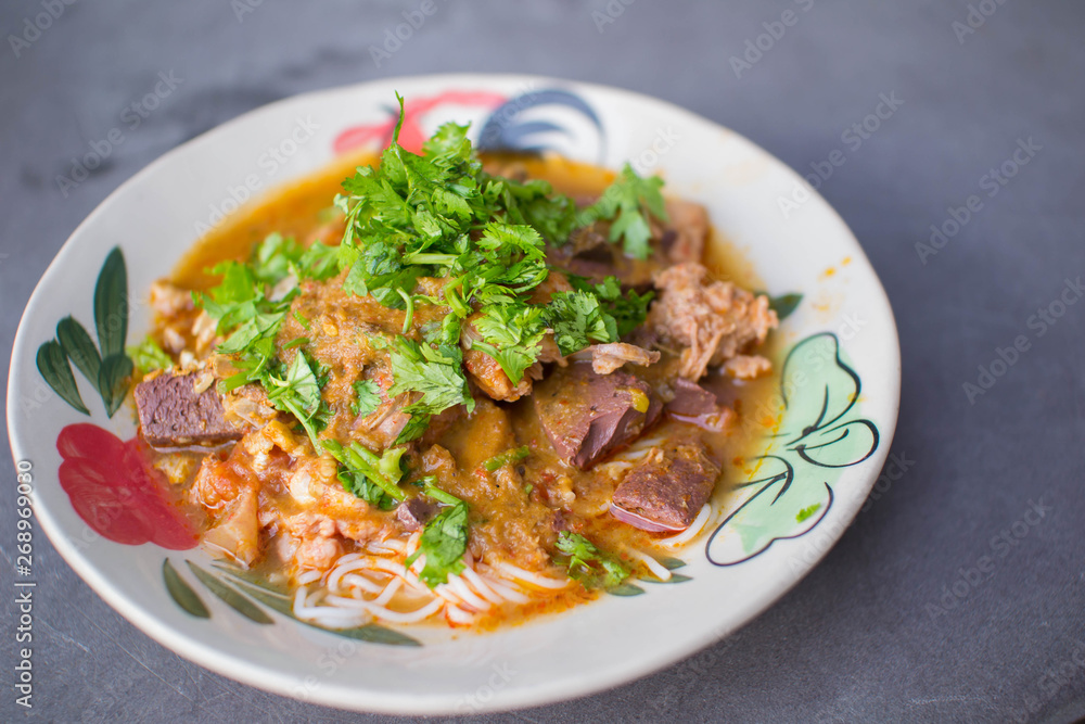 Nam Nguan Noodle, Rice noodles with spicy pork sauce.