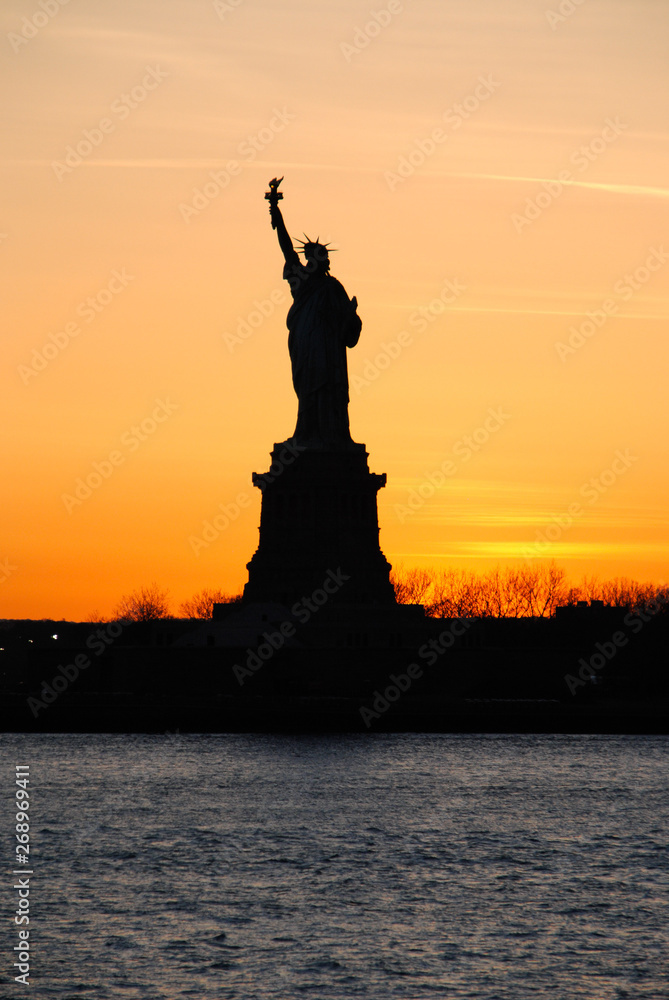 Amazing view of the Statue of Liberty, at sunset Amazing view of the Statue of Liberty, at sunset