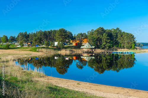 Landscape with the image of lake Seliger bank in Russia