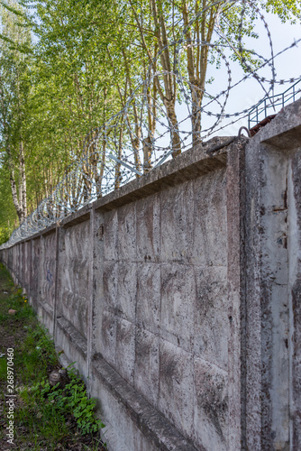 Concrete Wall with Razor Wire in Riga Latvia