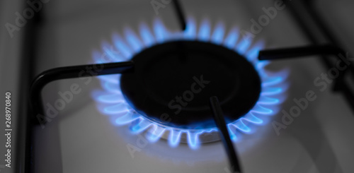 Natural gas flame burning on kitchen stove