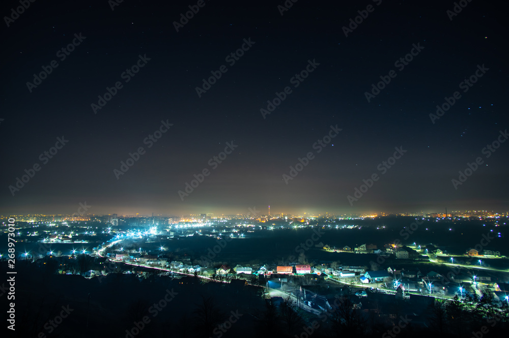 Night city in the haze