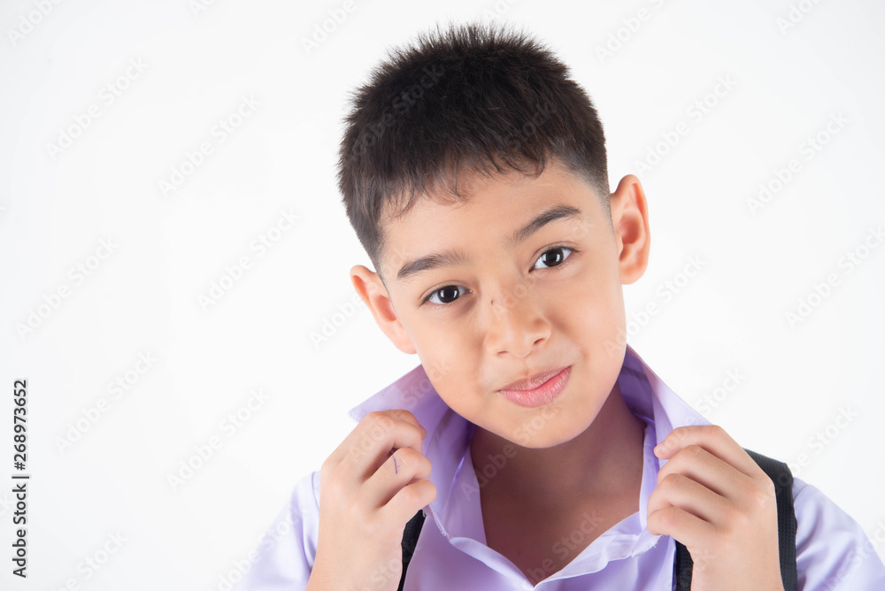 Little Asain boy in student uniform on white background Little Asain boy in student uniform on white background