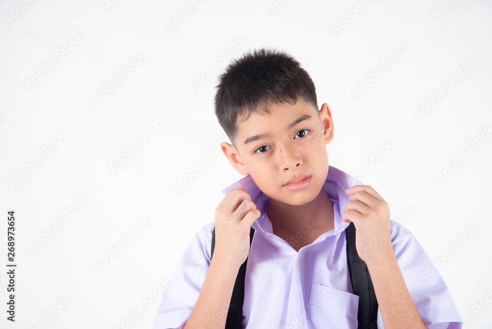 Little Asain boy in student uniform on white background Little Asain boy in student uniform on white background