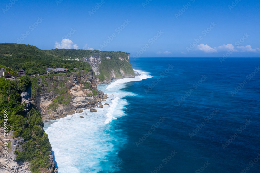 beautiful uluwatu cliff with blue sea