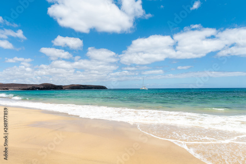 Panorama of beautiful beach and tropical sea of Lanzarote. Canaries