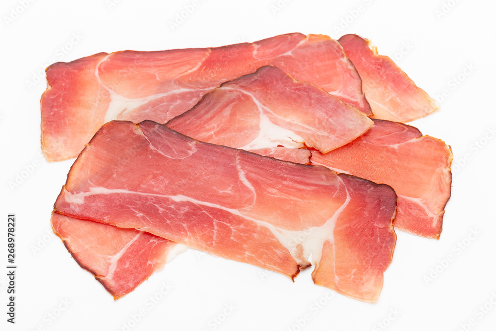 Hamon sliced on white background. Spanisch traditional meat. Hamon sliced on white background. Spanisch traditional meat.