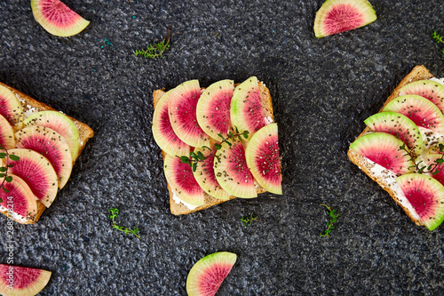 Healthy breakfast toasts from sliced watermelon radish