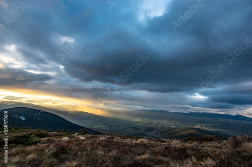 Stormy sky at sunset in the mountains