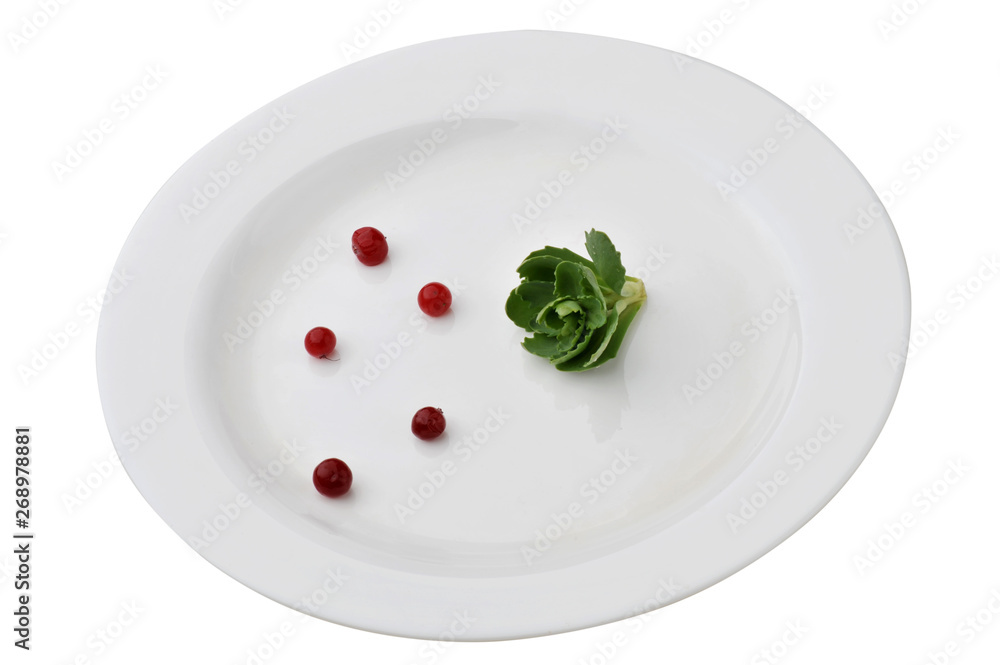 Leaf vegetable on large white plate isolated on white background Leaf vegetable on large white plate isolated on white background