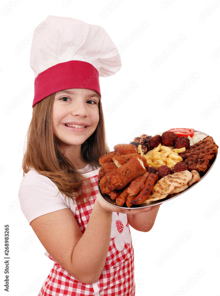 happy little girl cook with mixed grilled meat on plate happy little girl cook with mixed grilled meat on plate