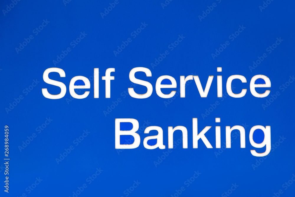 Self service banking sign on blue background. Finance business concept.