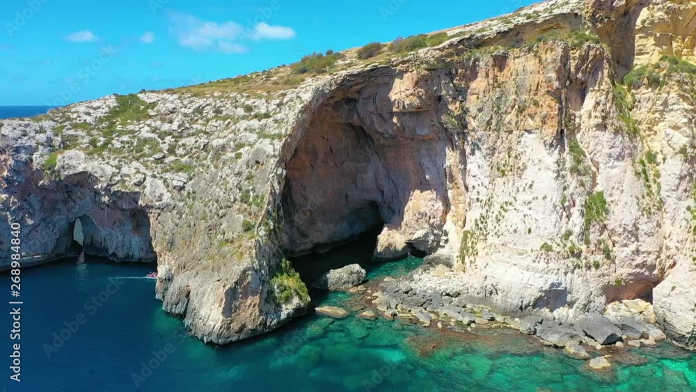 Blue Grotto in Malta, aerial view from the Mediterranean Sea to the island Blue Grotto in Malta, aerial view from the Mediterranean Sea to the island