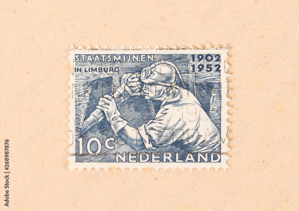 THE NETHERLANDS 1950: A stamp printed in the Netherlands shows the mining of coal, circa 1950