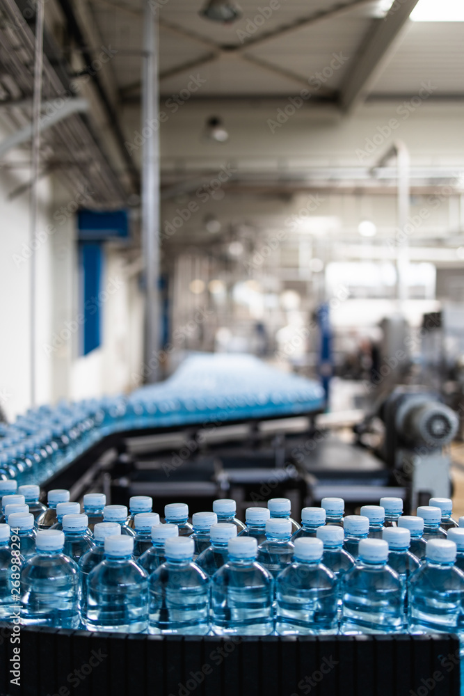 Bottling plant - Water bottling line for processing and bottling pure mineral carbonated water into bottles. Bottling plant - Water bottling line for processing and bottling pure mineral carbonated water into bottles.