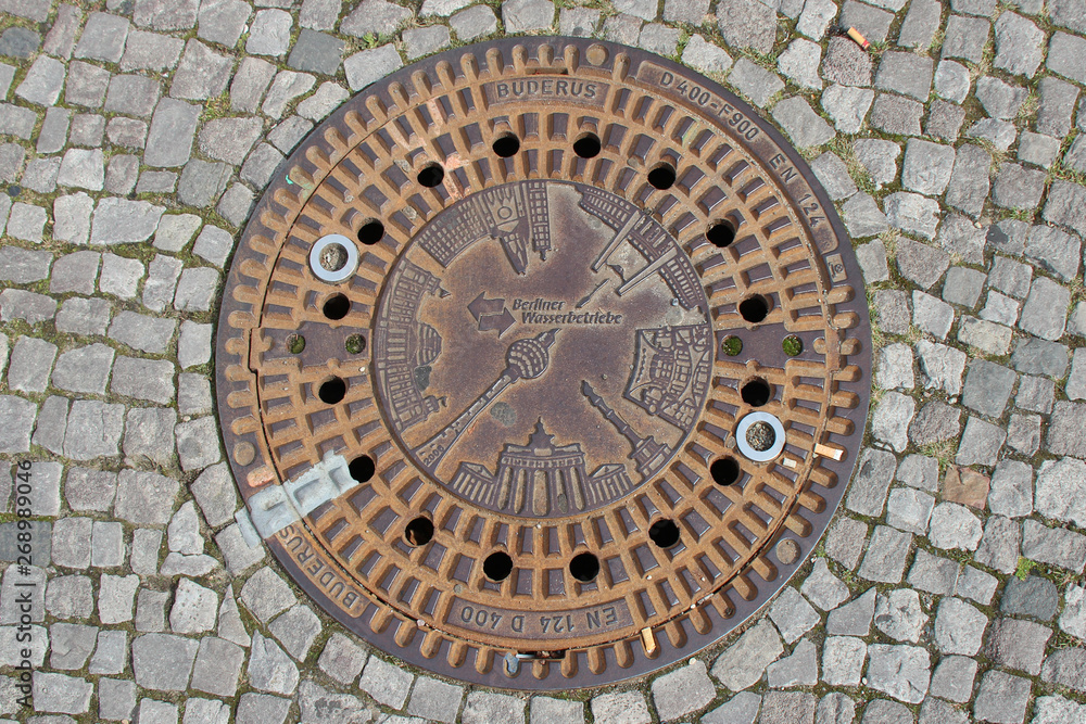 manhole cover at pariser platz in berlin (germany) 