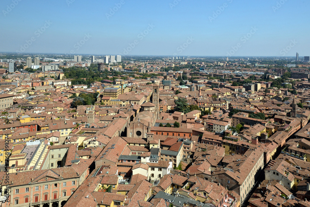 Aerial panoramic cityscape of Bologna, Italy, above rooftops of typical houses, ancient buildings and medieval towers