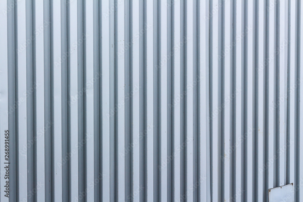 Trapezoidal metal sheet. Macro details and framed for background textures. Trapezoidal metal sheet. Macro details and framed for background textures.