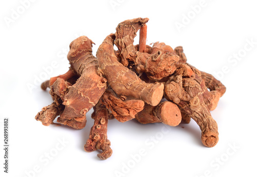 Alpinia officinarum, known as lesser galangal, or Havlucan. Dried Root. Isolated on white background